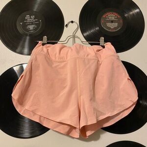 Athleta Medium High Rise "Run With It" 2.5 Soft Peach Colored Short